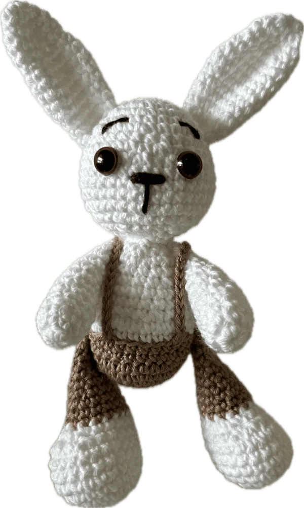 Bianco amigurumi all'uncinetto fatto a mano